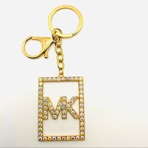 Purse Charm Key Chain MK in Iridescent Crystals set in golden tone. BRAND NEW